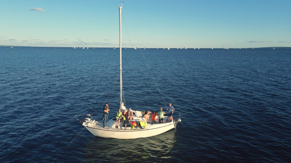 A sailing boat on a wide ocean