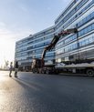 Picture of a truck delivering a timber deck in front of the Navitas building in Aarhus