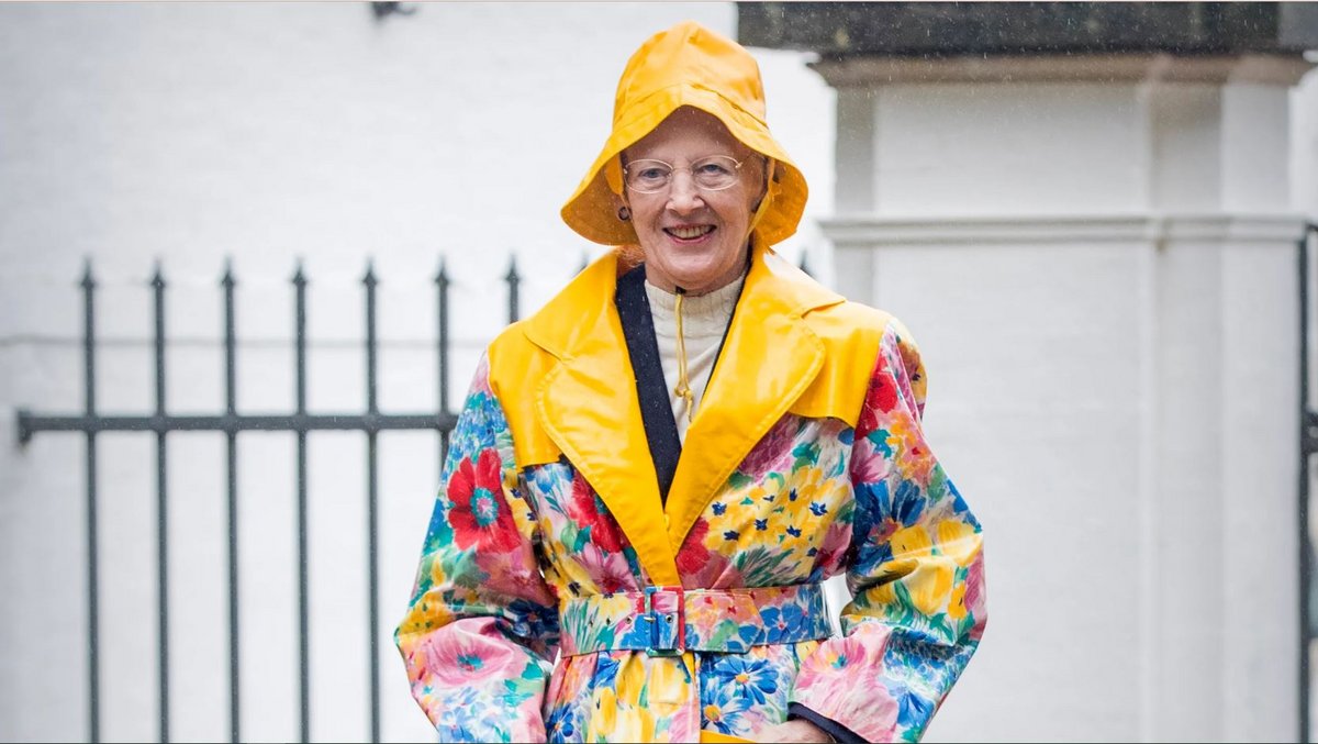 Danish queen wearing yellow raincoat 